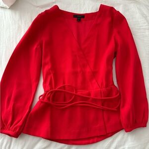 Jcrew blouse with ties around waist. 0P size in orange red color. Like new